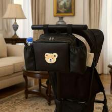 Artículo esencial para madres y bebés - Bolsa de almacenamiento multifuncional para cochecito de bebé - Diseño de gran capacidad, puede contener botellas de agua, biberones, pañales, pañuelos, accesorios de teléfono móvil. El almacenamiento categorizado es ordenado y conveniente. Diseño de patrón de cabeza de oso a la moda y lindo. Ligero y duradero. Regalo de temporada perfecto para Halloween y Navidad. - Multicolor - Ver 9