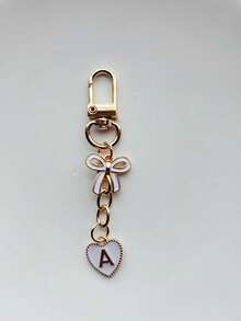 New Elegant White Bow Heart-Shaped Oil Dripping Letter Keychain, 26 A-Z Letter Alloy Keyrings, Fashionable Classic Romantic Metal Accessories, Ideal Birthday/Holiday Gifts For Women, Keychain, Bag Pendant, Car Decoration, Best Gift