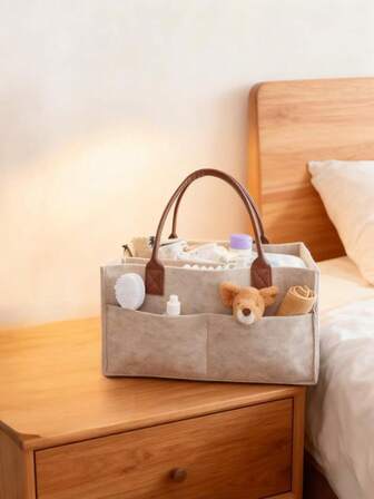 1个毛毡尿布包。适合居家/婴儿/外出/旅行。加厚升级多功能手提包。纯色，简约风格。毛毡材质不易变形。轻便易携。多口袋设计，容量大。四隔层可调节空间设计。