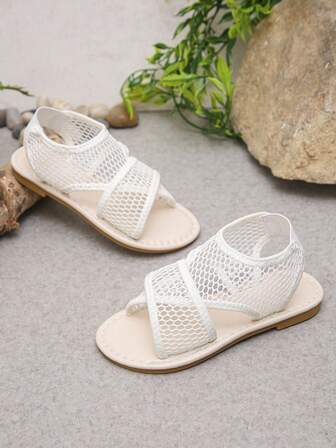 Barnens platta sandaler med andningsfunktion, mjuka och bekväma, lämpliga för sommaren