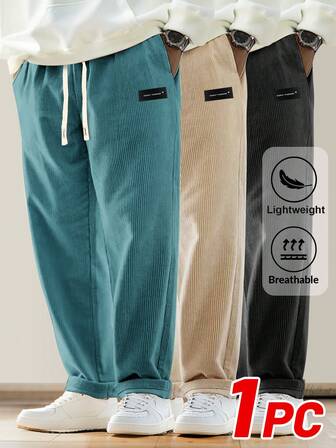 กางเกงคอร์ดูรอยสีพื้นแบบสบายผู้ชาย มีเชือกผูก มีกระเป๋า หายใจได้ ผ่านสบาย เหมาะสำหรับกิจวัตรประจำวัน ฤดูใบไม้ผลิ/ใบไม้ร่วง