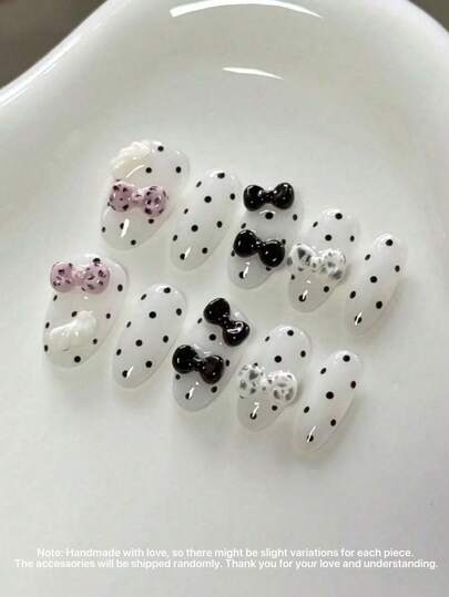 Sweetheart Girl Cute Style 10-Piece Long Sleeve Elliptical Pressed Nails, Ice-Transparent White Base Color With Black Dots, 3D Pink And Black Bows And White Wings Decorations, A Playful, Cute, Retro, Elegant And Sophisticated High-End Fashion Nail. Suitable For Daily Use As Both A Bold And A Delicate Look, It Is Suitable For Dates, Outings, Casual And Light-Chic Outfits And Can Be Reused.