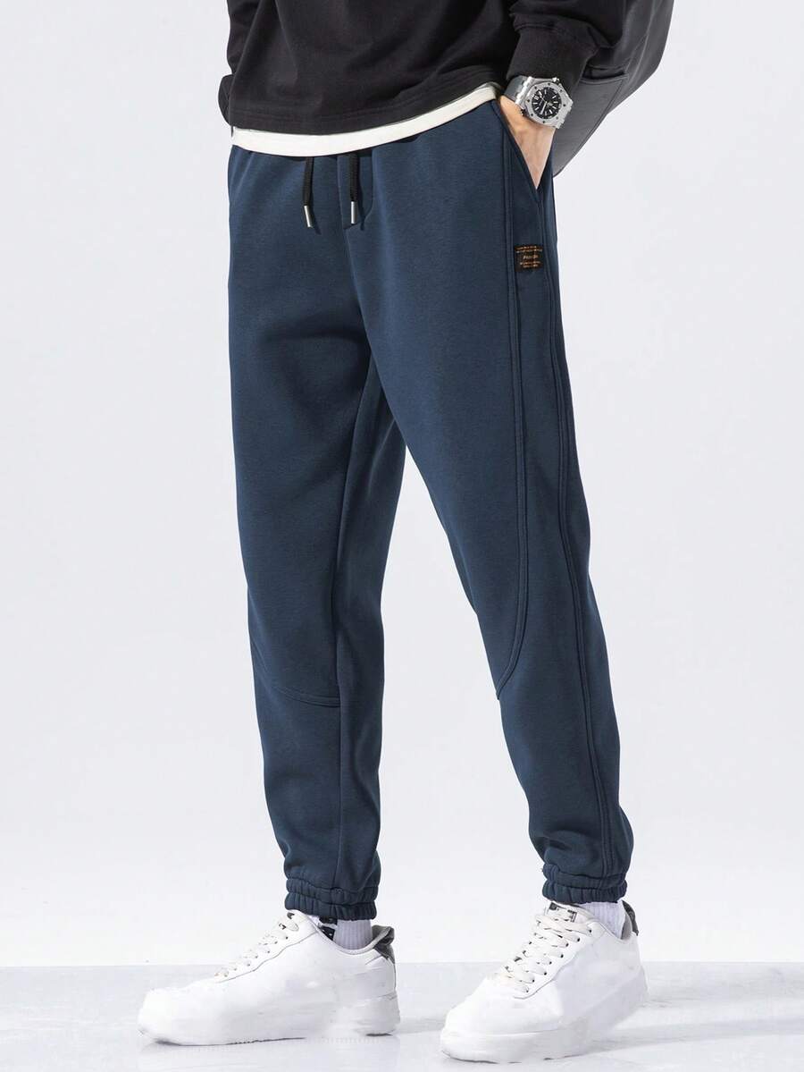 Pantalones de chándal casuales con cordón en la cintura y bolsillo con bordado de letras para hombre - Azul Marino - Ver 1