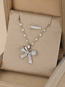 1 Stück süße, modische, exquisite, elegante Kupfer- und Zirkonia-Schleife Anhänger, Gold- und Silber-Edelstahl Halskette für Frauen, Party- und Straßen-Schmuck für den täglichen Gebrauch