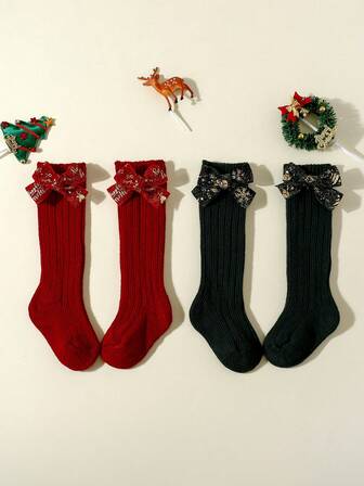 2 ชิ้น ถุงเท้าสูงถึงเข่าลายโบว์สีพื้นสำหรับเด็กผู้หญิง เหมาะสำหรับปีใหม่และคริสต์มาส