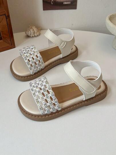 1 Pair Children/Girls' Water Rhinestone Hollow Woven Summer Decorative Sandals (Design Full Of Summer Brilliance, Using Water Rhinestone Hollow Woven Craftsmanship), PU Material (Upper Made Of PU Leather), Non-Slip And Wear-Resistant Low-Top Design (Low Shoe Collar), Closure, Flat Summer Sandals, Suitable For Summer Outings, Summer Fashion Events, Etc.