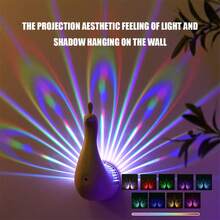 مصباح إضاءة جداري ديكوري بتأثير طاووس، يعمل بالبطارية وبإمكانية الشحن عبر USB، بأضواء ملونة متعددة الألوان، يخلق جوًا حميميًا ومريحًا، مناسب للغرفة النوم والمكتب والمطعم، هدية رومانسية مثالية