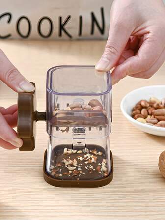 1PC. Manual Grain Crusher. Nut Grinder. Nut Kernel Grinding Machine. Specially For Dried Nuts Such As Chocolate, Peanuts, Walnuts, Etc. Suitable For Pies, Cakes, And Crushing Spices. Easy To Clean, Compact And Labor-Saving.