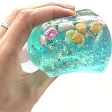 Đồ chơi bóp giảm căng thẳng hình chó Maltese chủ đề đại dương - Được trang trí bằng vỏ sò, ốc xà cừ, đàn cá và các chi tiết kem hoạt hình, giúp giảm lo âu hiệu quả. Thích hợp cho không gian ngoài trời và môi trường văn phòng, mang đến trải nghiệm giảm căng thẳng mọi lúc, mọi nơi. Là một vật trang trí bàn làm việc dễ thương, đây là món quà lưu niệm hoàn hảo cho các bữa tiệc hoặc quà tặng ngày lễ! - Nhiều màu - Xem 4