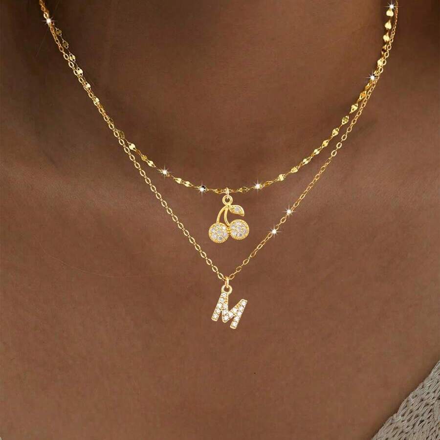 مجموعة من قلادتين 2 قطعة، قلادة بحرف أولي مرصعة بالزركونيا على شكل كرز، سلسلة معدنية مطلية بالذهب، قلادة طبقات للنساء - ذهبي أصفر - مشاهدة 1