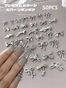 50 قطعة مجموعة متنوعة من الفيونكات المطلية بالفضة ثلاثية الأبعاد بتصاميم بسيطة، سلسلة فيونكات الراتنج المختلطة، إكسسوارات متعددة الوظائف DIY لتزيين الأظافر والشعر والهواتف والأقراط والألبومات، تزيينات أظافر وأحجار أظافر - فضي - مشاهدة 1