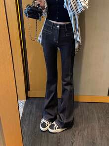 女士高腰休闲牛仔裤，特殊剪裁设计，优化腿部线条，水洗效果