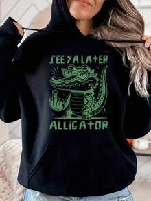 See Ya Later Alligator Graphic Oversized Hoodies Sweatshirts For Women, Long Sleeve Pocket Pullover, Girls Sweatshirts, Fall Fashion 2025 Pullover, Letter Print Winter Clothes, Casual Women Clothes For Fall And Winter, Suitable For Parties, Outdoor Activities, And Leisure, Gift For Women, Size S-3XL - Black - View 1