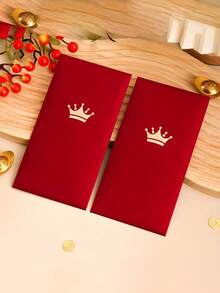 1/18个高品质情人节红包，采用金色箔片设计，饰有皇冠和蛋糕元素，适用于新年、生日等场合，质感面料凸显品质，适用于节日送礼、庆祝祝福等场合，适合注重礼仪的人士和送礼者，适用于春节、情人节和派对等场合。