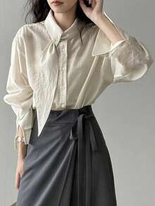 女士时尚通勤不规则领长袖衬衫，纯色梭织面料，不对称/不规则前襟纽扣，休闲办公日常穿着，春夏款 - 鵝黃色 - 查看 5