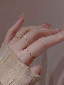 Nooxian 4pcs Gold Embossed Stackable Basic Copper Knuckle Rings Set For Women