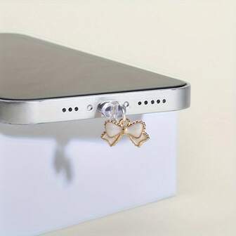 1pc Metal Bowknot Decor Phone Charging Port Dust Plug Pendant Charm, Compatible With Apple, Android, Type-C, Creative Accessory