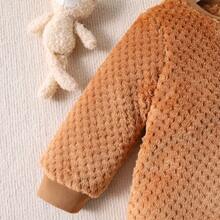 1件新生儿杏色柔软绒面宽松可爱睡袋襁褓，适合宝宝更好地休息