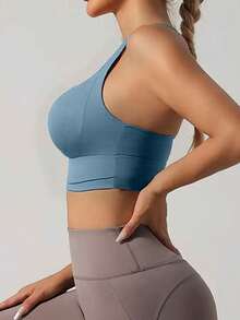 Áo tank top yoga, áo bra thể thao thoáng khí với chức năng giảm sốc và định hình, tạo đường cong lưng đẹp, phù hợp cho các bài tập thể dục mùa xuân. - Màu xanh lá cây đậm - Xem 9