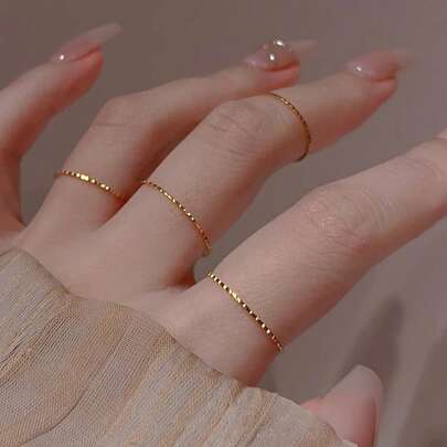 Nooxian 女性用 4個セット ゴールド エンボス スタッカブル ベーシック カッパー ナックルリング