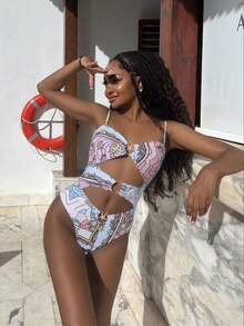 2026新款性感连体泳衣，女士无肩带领口镂空设计，彩色印花，适合度假、海滩、情人节等场合。