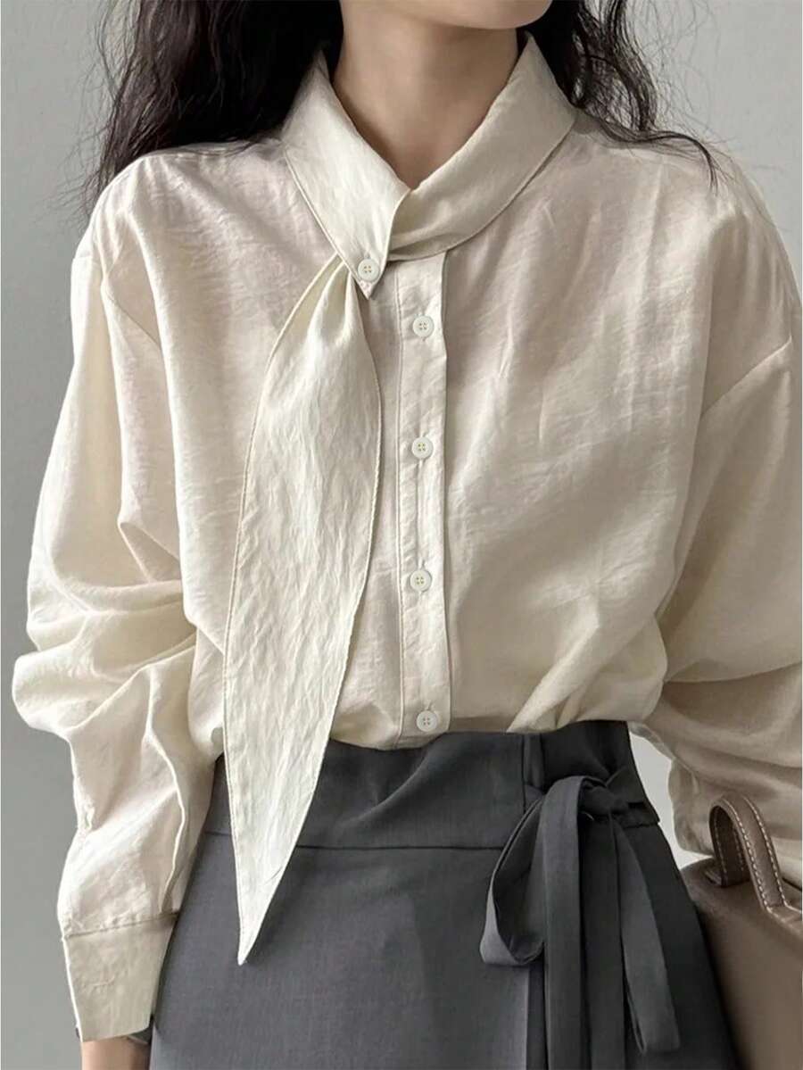 女士时尚通勤不规则领长袖衬衫，纯色梭织面料，不对称/不规则前襟纽扣，休闲办公日常穿着，春夏款 - 鵝黃色 - 查看 1