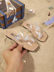 儿童时尚拖鞋，夏季新款，饰有水钻蝴蝶结，闪亮时尚，方便轻便，适合儿童沙滩穿着。 - 無色 - 查看 3