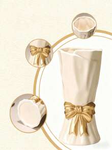 这款波西米亚风多功能蝴蝶结花瓶是家居装饰的理想之选，适合摆放在架子、桌子或客厅中。（实物尺寸略小，请在购买前注意） - 彩色 - 查看 7