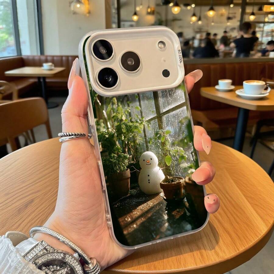 Cubierta de telefono transparente con borde blanco diseño de muñeco de nieve y plantas para iPhone uso diario en cafeterias - Negro - Ver 1