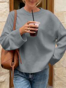 Nuevo suéter de punto minimalista de unicolor con cuello redondo y manga larga para mujer, para otoño e invierno, nuevo suéter casual para ir al trabajo, suave y cómodo, holgado, top de moda para Año Nuevo