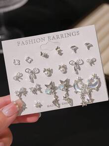 11 对猫眼耳钉套装，浅色蝴蝶结，闪光粉色耳环，锌合金水钻耳环，时尚适合日常佩戴，送给女朋友的礼物