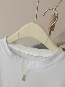 白色露脐短款上衣，性感风格，夏季新款，短袖T恤，印花露脐T恤，百搭休闲女装 - 白色 - 查看 2