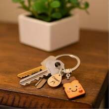 送给女性的全新开始礼物——祝酒钥匙扣，送给即将离职同事的礼物，送给新订婚夫妇的订婚派对礼物（带挂饰），送给首次购房者的乔迁礼物