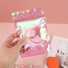 50 Stück regenbogenfarben transparente selbstversiegelnde Beutel, Laser-selbstversiegelnde Beutel - halbtransparente farbige Geschenkverpackung geeignet für Ohrringe, Schmuckgeschenke usw. - Verschiedenfarbig - Übersicht 2