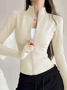 Chaqueta deportiva de manga larga con cremallera de color liso para mujer, corte ajustado y puños con abertura para el pulgar, ideal para fitness, yoga y running. - Marfil - Ver 1