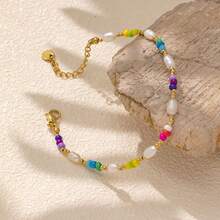 A Colorful Beaded Bracelet In A Leisure And Vacation Style, Made Of Stainless Steel And Adorned With Freshwater Pearls. This Is A Fashionable Handchain For Ladies, Featuring A Bohemian Style. Friendship Bracelet. - Colorful - View 1