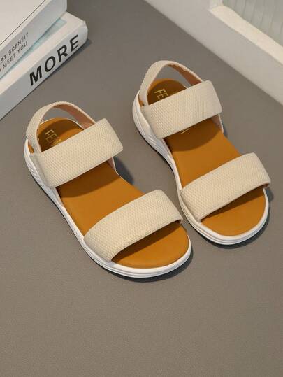 A Pair Of New Summer Elastic Band Sandals For Children In 2025 - Beige Design, Fashionable, Casual, Simple And Comfortable. They Are An Excellent Choice For Campus Life, Daily Outings, Park Walks, Shopping In Malls And Beach Play, And Can Be Easily Matched With All Kinds Of Children's Clothing
