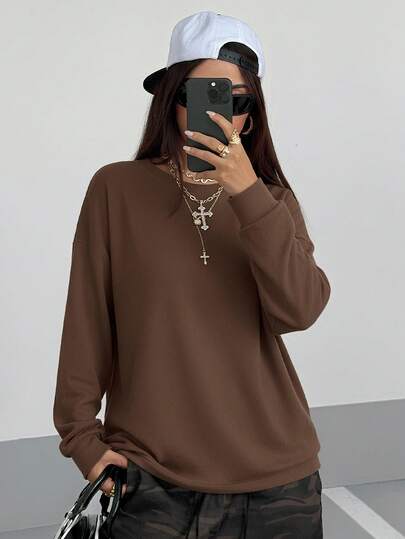 Esta camiseta de manga larga de cuello redondo de unicolor, con un ajuste holgado, casual, de moda y deportivo, al estilo estadounidense, es adecuada para viajar, salir con amigos, fiestas, compras, fotografía callejera, deportes, baile, fitness y uso diario.