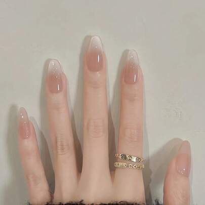 30片杏仁形/简约杏粉色美甲贴纸，亚克力假指甲套装包含1瓶甲油胶和1把指甲锉，适合女性日常工作、学习、聚会、派对、节日以及秋冬季日常美甲用品。