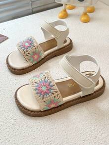 A Pair Of Summer Bestsellers, The Girls' Hook-Patterned Hollowed-Out Flat Sandals, Are Fresh And Sweet. The Colorful Patterned Anti-Slip Open-Toe Buckle Princess Shoes Are A Must-Have For A Gentle Style When Little Girls Go Out