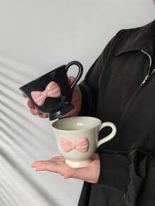 1pc Black & Pink Bow Ceramic Cup, Cute & Sweet Ceramic Cup With 3D Bow And Stem Design, Suitable For Coffee, Beverages, Sweet & Chic Home Decor And Gifts For Friends