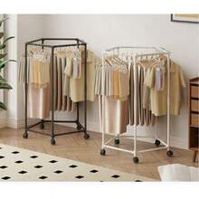 落地式晾衣架，大容量，360°旋转轮设计，五/六边形多臂悬挂设计，高效通风，节省空间，可折叠，实用便捷，适用于室内阳台、浴室、衣柜、宿舍等场所，多功能收纳整理，是家庭日常洗衣的理想之选，也是圣诞节和节日家居焕新的完美礼物，移动方便，是现代紧凑型家居的理想之选。