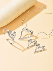 一套四件时尚简约波浪纹项链、镂空心形吊坠耳环和手链首饰套装。夸张独特的镂空金属大心形耳环、手链和项链套装，适合女性日常、度假和派对佩戴（光滑表面可能偶尔有划痕或瑕疵，敬请谅解）。 - 銀色 - 查看 3