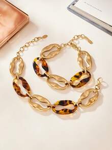 1 Set de joyería vintage con estampado de leopardo, que incluye pulsera de acero inoxidable con nariz de cerdo de resina, aretes y collar, un diseño único - Dorado - Ver 8