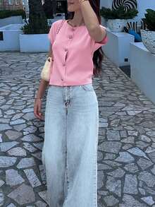 Camiseta sin mangas de punto para mujer, nueva colección primavera/verano, de estilo minimalista y elegante, con cuello redondo, diseño sin mangas, decoración con botón con forma de corazón, top corto y ajustado en color rosa, adecuado para uso casual, trabajo, viajes, citas, ceremonias de graduación y fiestas - Rosa - Ver 5