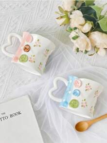 1 Stück kreative handbemalte Blumen- & Schleifen-Keramiktasse mit herzförmigem Henkel - Verschiedenfarbig - Übersicht 2
