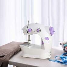 Máquina de coser eléctrica de tamaño pequeño, con función de doble velocidad, para utilizar dos hilos simultáneamente. Compacta y ligera, ideal para uso doméstico. Una opción perfecta para principiantes. Adecuada para trabajos manuales y reparaciones. - Blanco - Ver 5