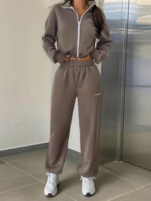 Tuta da donna GAOVOT, composta da felpa con cappuccio e pantaloni a gamba larga, in stile casual e comodo, adatta per l'autunno/inverno, con zip - Grigio - Visualizzare 1