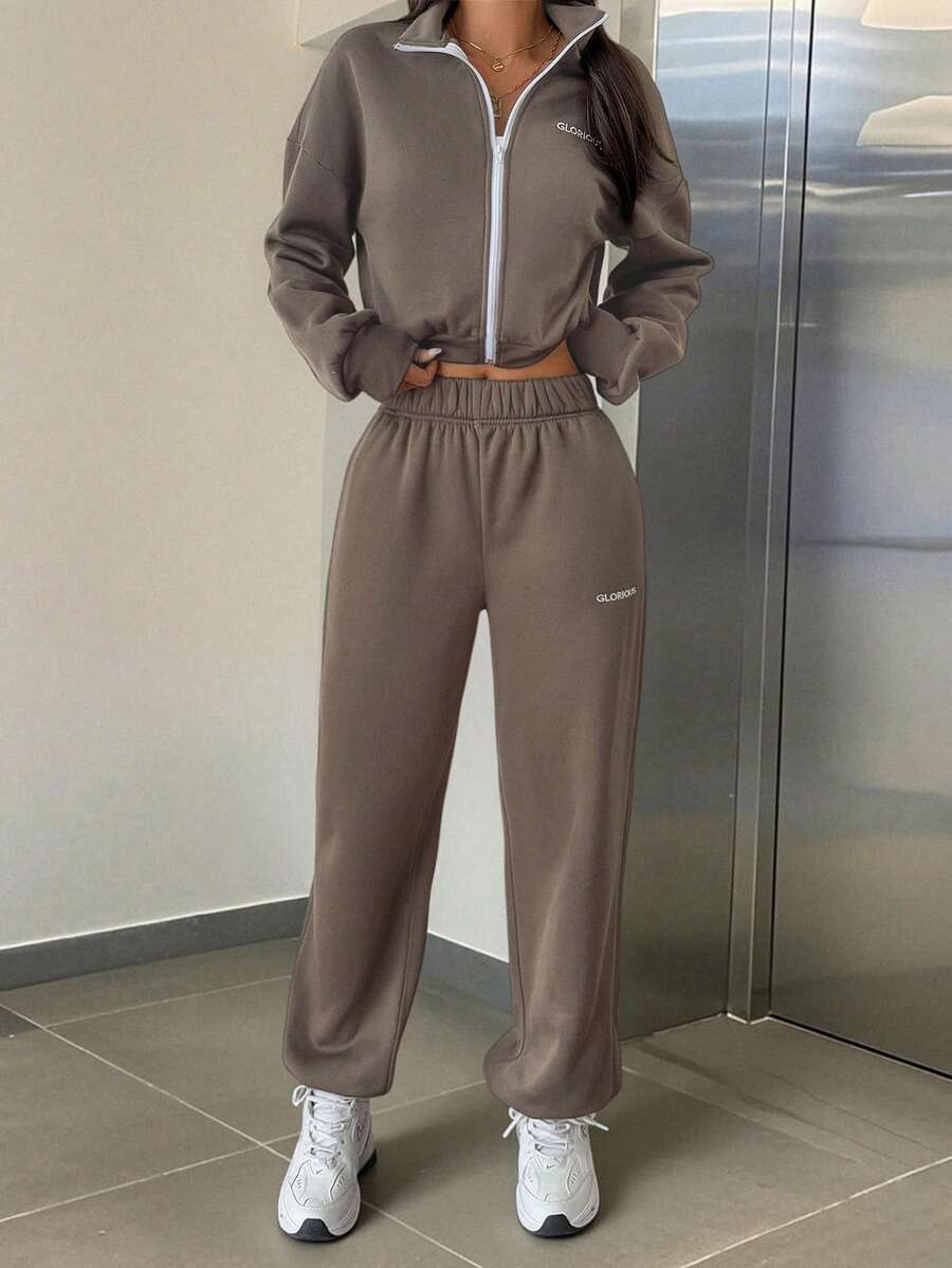 Tuta da donna GAOVOT, composta da felpa con cappuccio e pantaloni a gamba larga, in stile casual e comodo, adatta per l'autunno/inverno, con zip - Grigio - Visualizzare 1