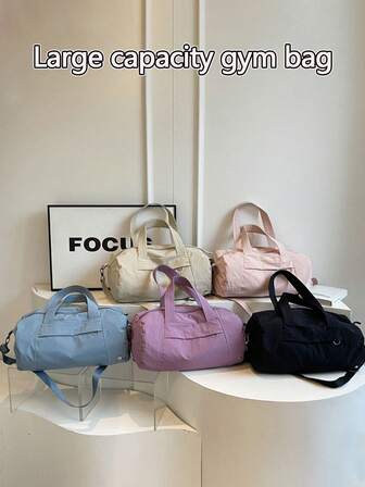 这款男女通用的运动健身包，单肩斜挎两用，带鞋仓和干湿分离口袋，适合锻炼、健身、瑜伽、普拉提、游泳、沙滩等各种场合，可作旅行行李包或手提包使用。大容量多口袋设计，还配有耳机收纳袋，轻便易携，适合户外旅行和短途出行，也是圣诞节、情人节和新年礼物的理想之选。